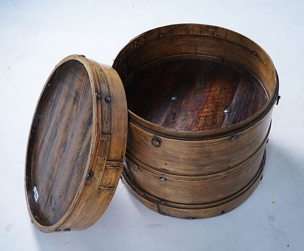 A SHAKER STYLE CIRCULAR THREE TIER STORAGE BOX