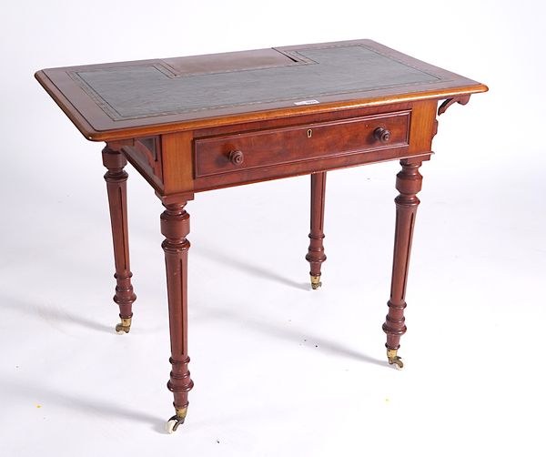 A VICTORIAN WALNUT SINGLE DRAWER WRITING TABLE