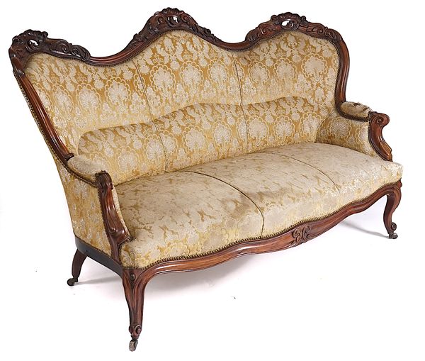 A 19TH CENTURY CARVED ROSEWOOD FRAMED DOUBLE SPOON BACK SOFA