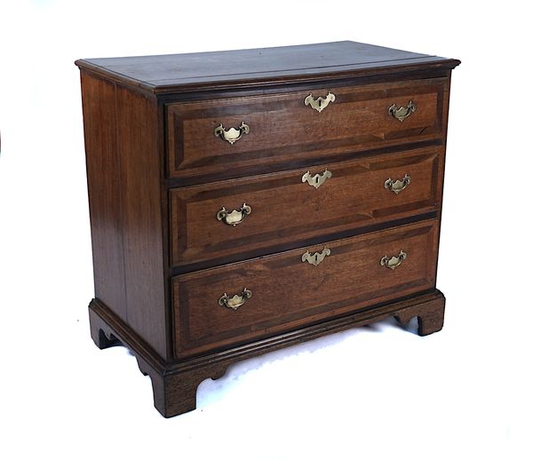 A MID-18TH CENTURY MAHOGANY BANDED OAK CHEST OF DRAWERS