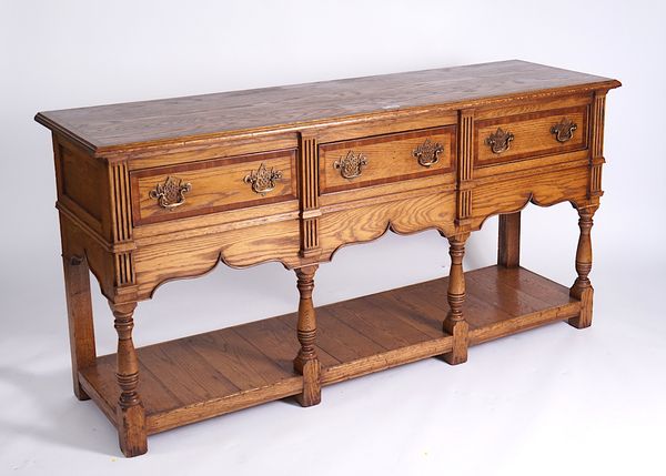 A 17TH CENTURY STYLE MAHOGANY BANDED OAK POTBOARD DRESSER