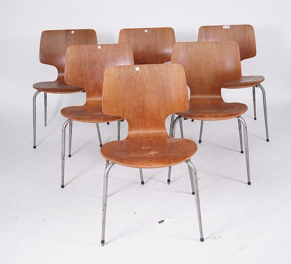 INDUSTRIAL DESIGN; A SET OF SIX LAMINATED BEECH AND TUBULAR STEEL FRAMED STACKING CHAIRS (6)