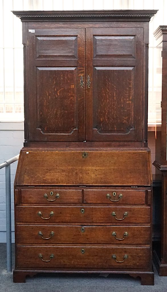 A GEORGE III OAK BUREAU BOOKCASE