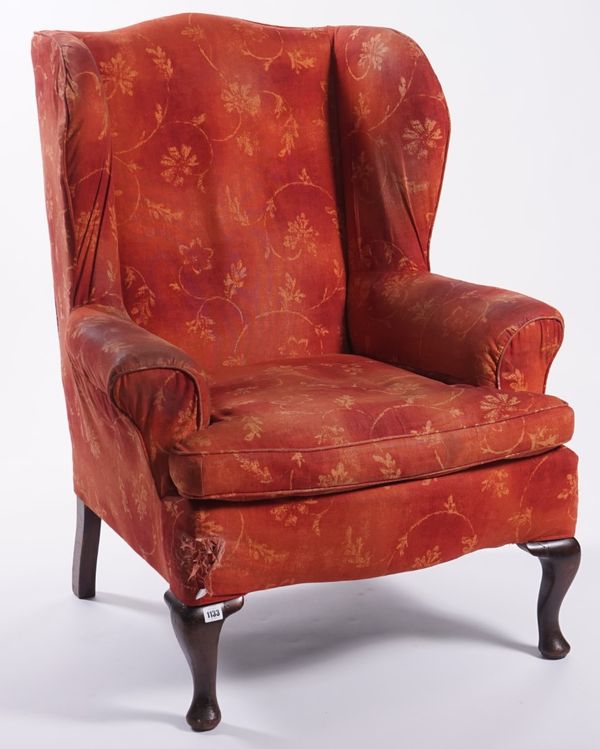 A GEORGE I STYLE WINGBACK ARMCHAIR, ON CABRIOLE SUPPORTS, CIRCA 1900