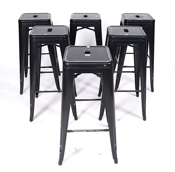 INDUSTRIAL DESIGN; A SET OF SIX MODERN BLACK PAINTED METAL STACKING STOOLS (6)