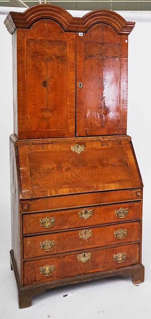 A GEORGE II ASH AND ELM DOUBE DOME TOP BUREAU BOOKCASE