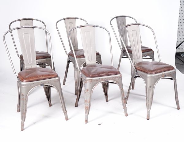 INDUSTRIAL DESIGN; A SET OF SIX LEATHER UPHOLSTERED METAL FRAMED TUB BACK STACKING DINING CHAIRS (6)