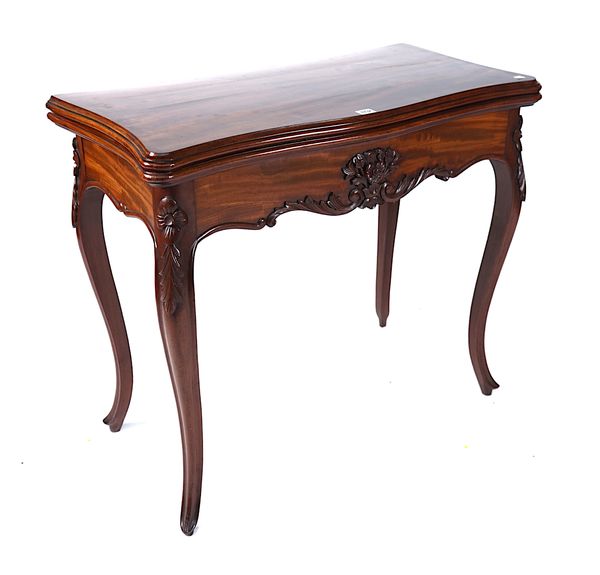 A 19TH CENTURY MAHOGANY SERPENTINE FOLD-OVER GAMES TABLE