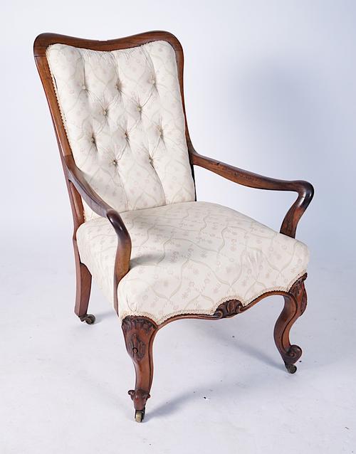 A 19TH CENTURY ROSEWOOD FRAMED OPEN ARM EASY CHAIR