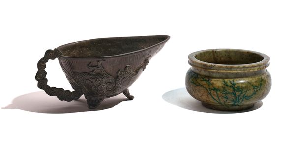 A CHINESE BRONZE POURING VESSEL