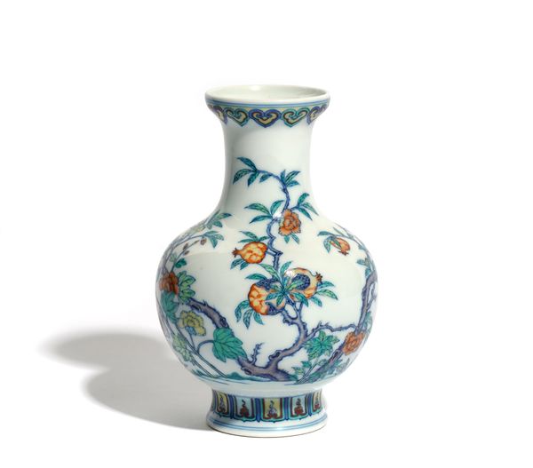 A CHINESE DOUCAI STYLE SMALL BALUSTER VASE