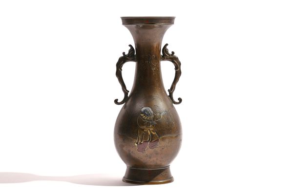 A JAPANESE BRONZE TWO-HANDLED VASE