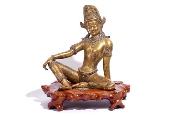 A NEPALESE GILT-BRONZE FIGURE OF INDRA