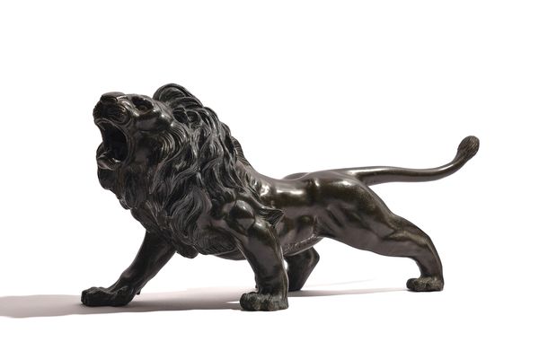 A JAPANESE BRONZE MODEL OF A LION