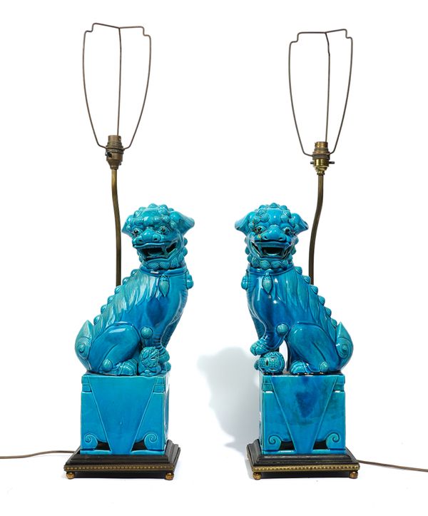 A PAIR OF LARGE CHINESE TURQUOISE GLAZED BUDDHIST LIONS