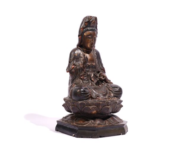 A CHINESE PAINTED AND GILTWOOD FIGURE OF GUANYIN