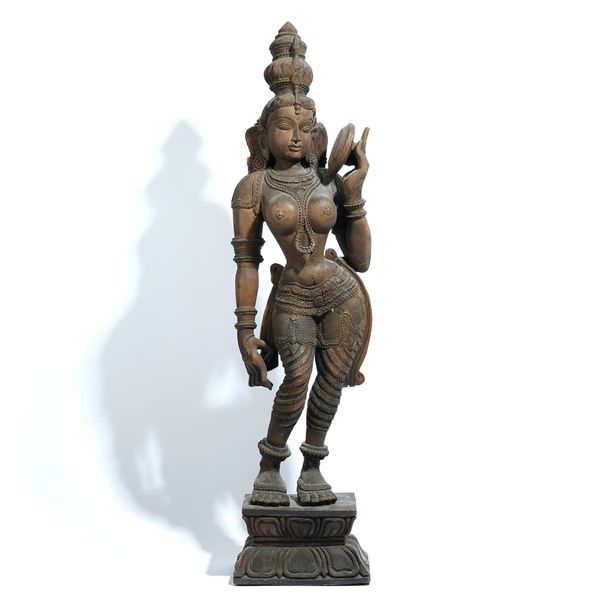 A LARGE INDIAN CARVED WOOD FIGURE OF AN APSARA