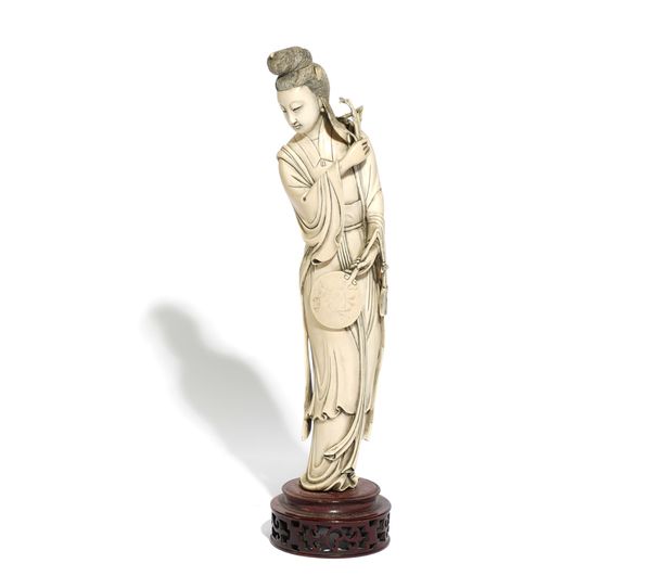 A CHINESE IVORY FIGURE OF A YOUNG WOMAN