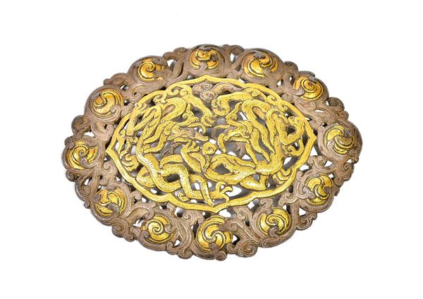 A CHINESE WHITE-METAL AND GILT SHAPED OVAL  PLAQUE