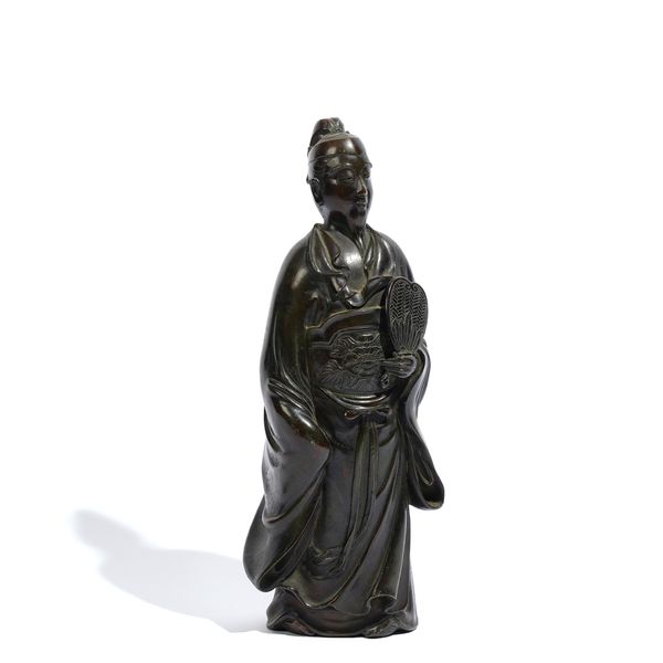 A PATINATED BRONZE FIGURE OF A CHINESE OFFICIAL