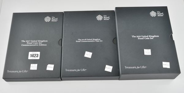 THREE UNITED KINGDOM COMMEMORATIVE PROOF COIN SETS