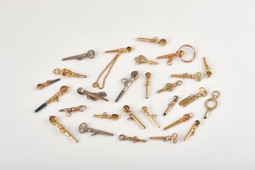 A COLLECTION OF TWENTY-SEVEN POCKET AND FOB WATCH KEYS (27)