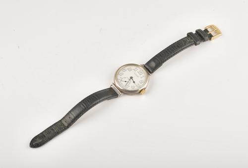 A SILVER CIRCULAR CASED WRISTWATCH