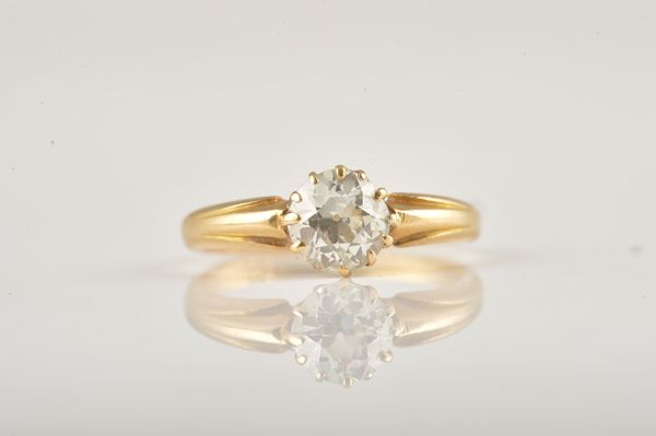 AN 18CT GOLD AND DIAMOND SINGLE STONE RING