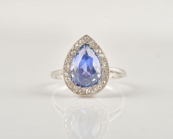 REVISED DESCRIPTION; A  SAPPHIRE AND DIAMOND PEAR SHAPED CLUSTER RING