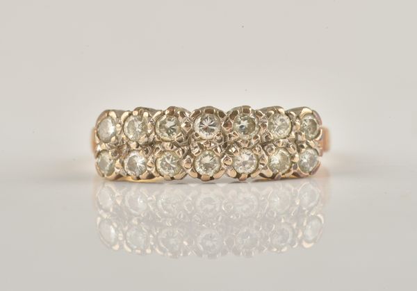 AN 18CT GOLD AND DIAMOND RING