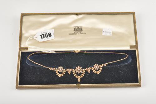A GOLD, DIAMOND AND SEED PEARL NECKLACE
