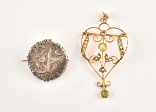 AN EDWARDIAN GOLD, PERIDOT AND SEED PEARL PENDANT AND COIN BROOCH (2)