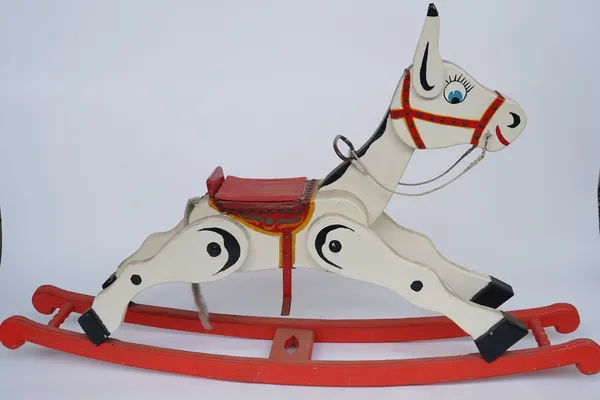 A PAINTED WOODEN MUFFIN THE MULE ROCKING HORSE