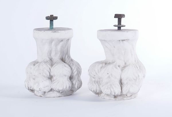 A PAIR OF CARVED WHITE STATUARY MARBLE LIONS’ PAWS