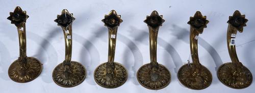 A SET OF SIX BRASS WALL LIGHTS