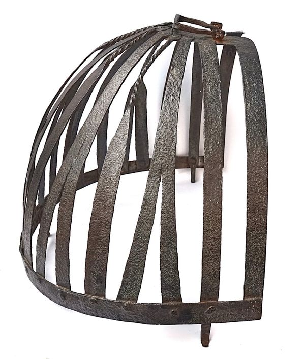 A WROUGHT IRON FIRE CURFEW OR GUARD