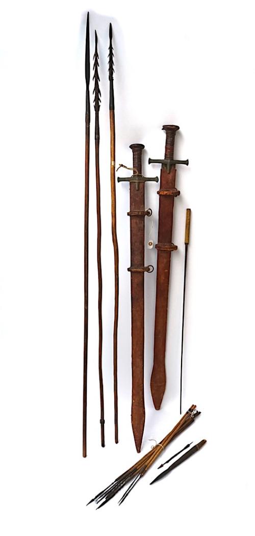A GROUP OF TRIBAL SPEARS, ARROWS AND OTHER WEAPONS