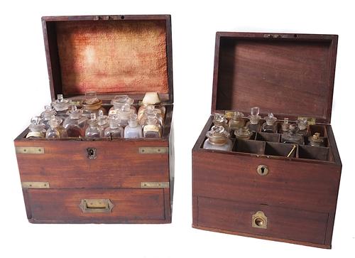A MAHOAGNY MEDICINE CHEST AND A BRASS BOUND MAHOGANY MEDICINE CHEST (2)