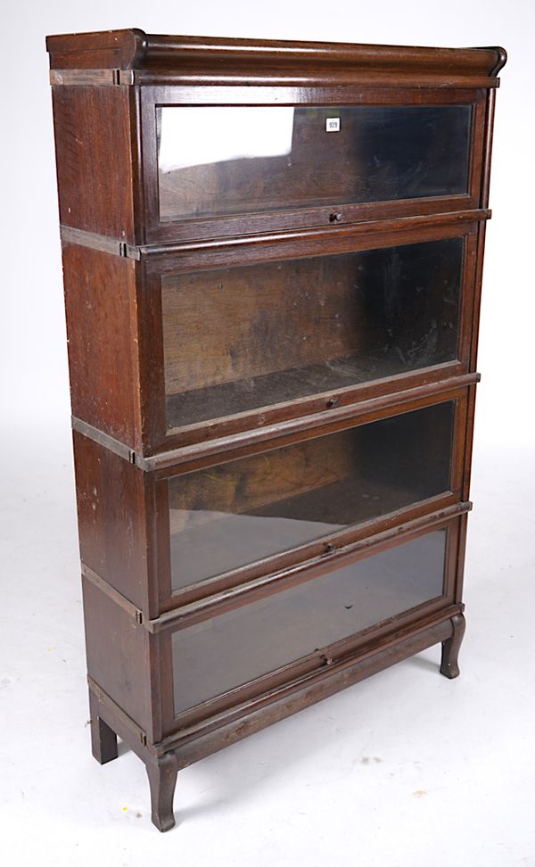 GLOBE-WERINCKE; AN OAK FOUR TIER BOOKCASE