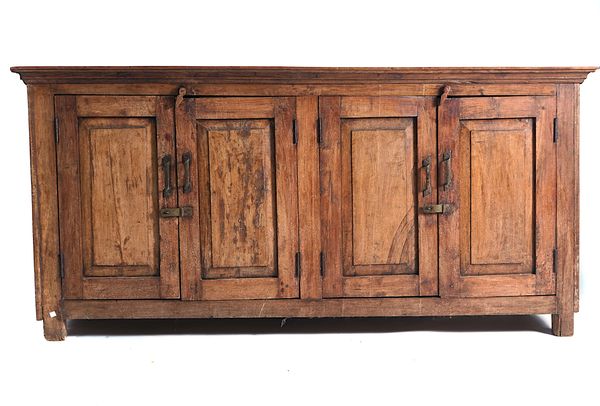 A LATE 19TH CENTURY TEAK FOUR DOOR SIDE CABINET