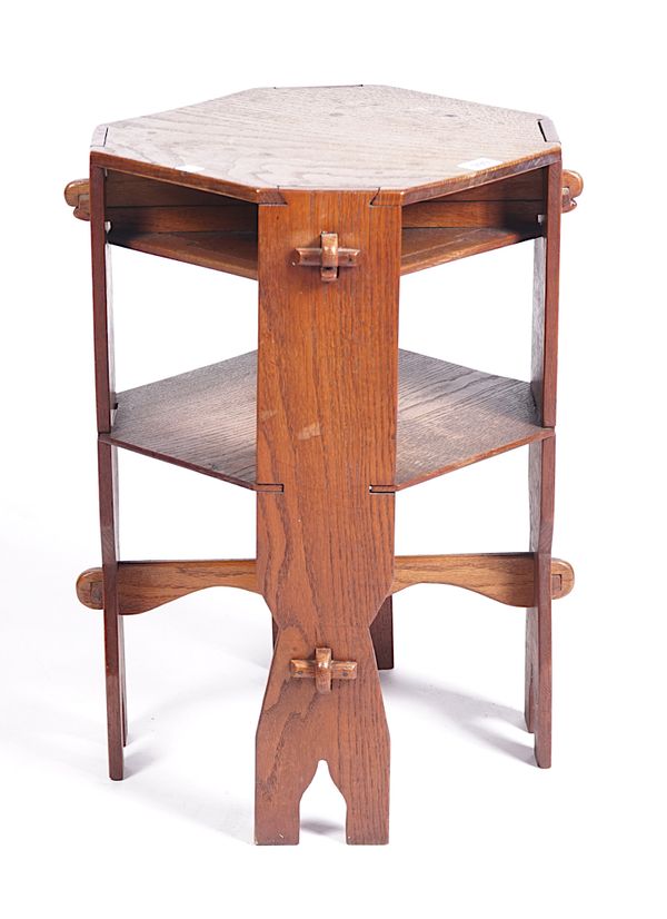 AN ARTS AND CRAFTS OAK CANTED SQUARE TWO TIER OCCASIONAL TABLE, WITH VISIBLE PEG CONSTRUCTION