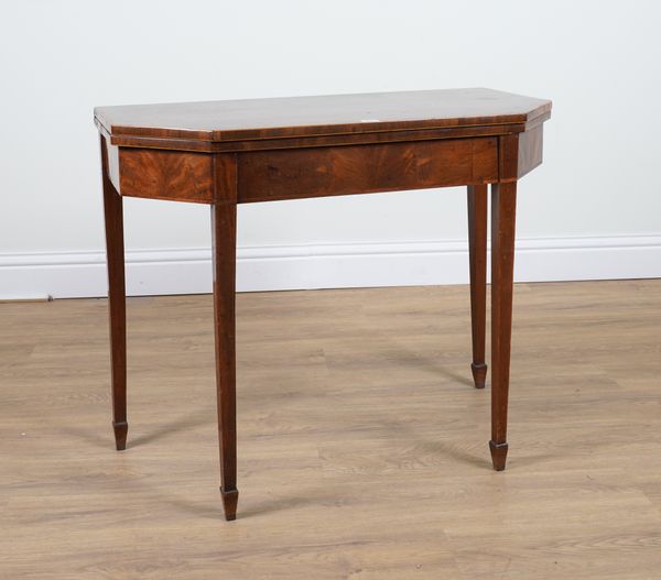 A GEORGE III MAHOGANY CANTED RECTANGULAR FOLDOVER TEA TABLE