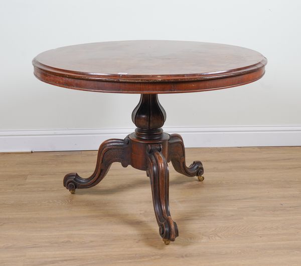 A VICTORIAN FIGURED WALNUT CIRCULAR SNAP TOP CENTRE TABLE