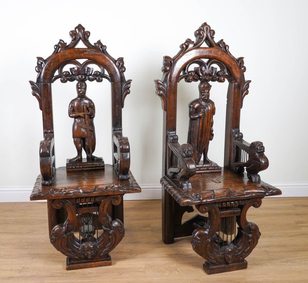 A LARGE PAIR OF CARVED OAK CHAIRS (2)