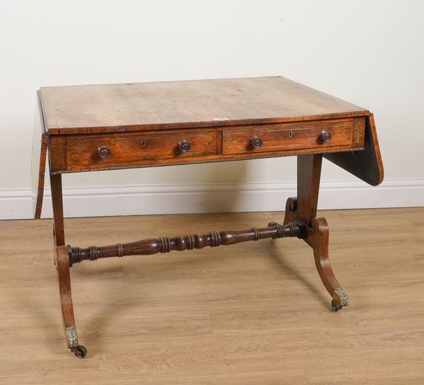 A REGENCY BRASS INLAID ROSEWOOD TWO DRAWER SOFA TABLE