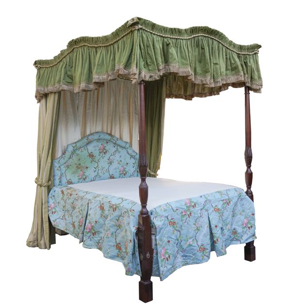 AN 18TH CENTURY STYLE MAHOGANY FOUR POSTER BED WITH SHAPED CANOPY AND TURNED SUPPORTS