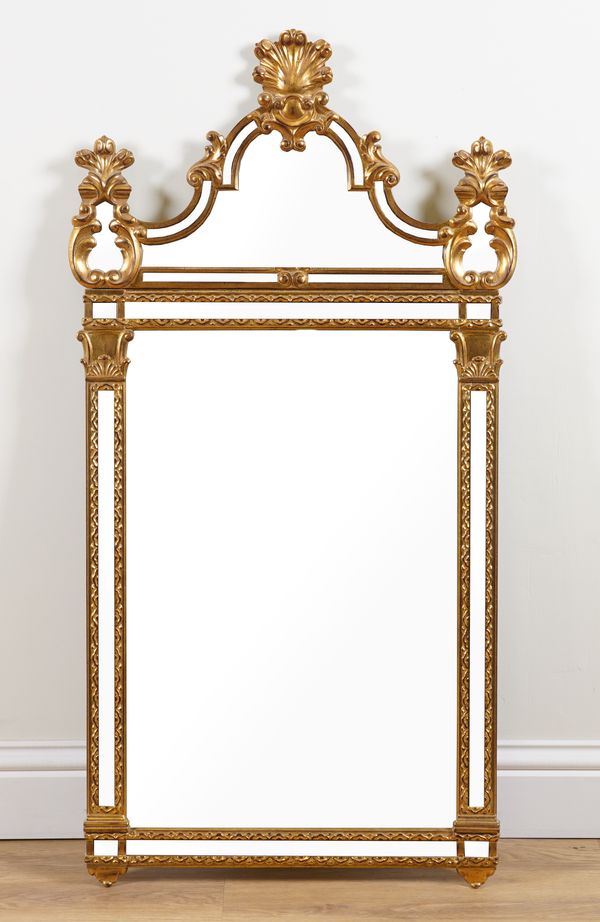 A GEORGE II STYLE GILT FRAMED ARCH TOP MARGINAL MIRROR