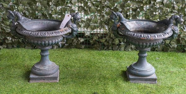 A PAIR OF EARLY 20TH CENTURY GREEN PAINTED CAST IRON JARDINERES (2)