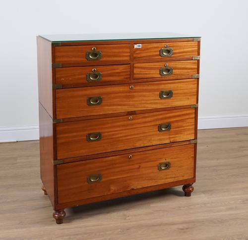 ROSS AND CO. DUBLIN; A 19TH CENTURY TEAK BRASS BOUND TWO SECTION CAMPAIGN CHEST  OF SEVEN DRAWERS