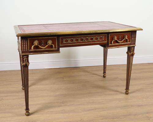 A LOUIS XVI STYLE GILT METAL MOUNTED MAHOGANY BUREAU PLAT